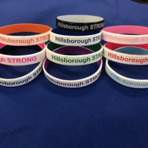 A set of Hillsborough string wrist bands