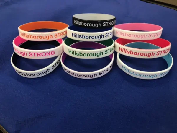 A set of Hillsborough string wrist bands